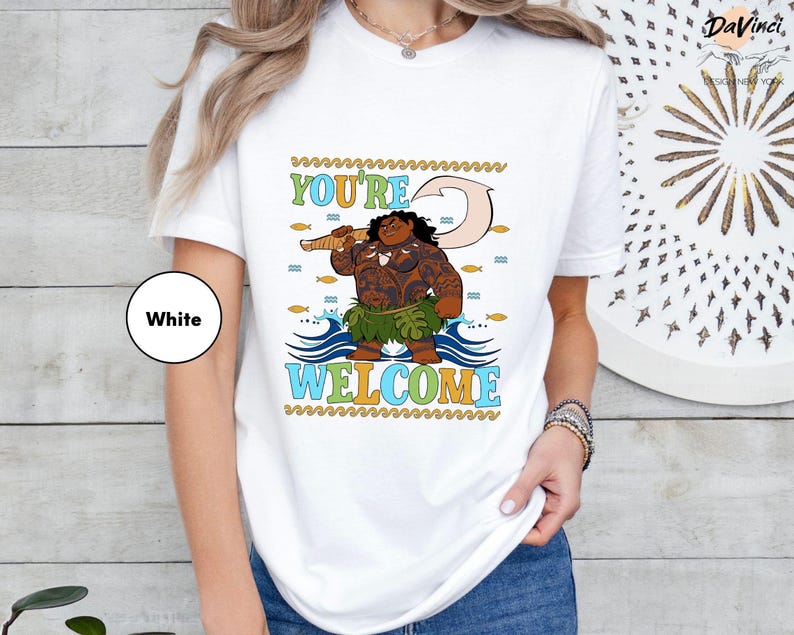 a woman wearing a white t - shirt that says you're 2, we