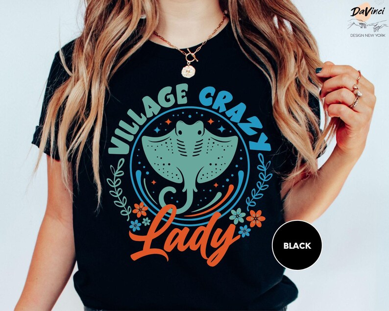 a woman wearing a black vintage crab lady t - shirt