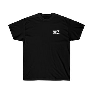 May include: Black t-shirt with a white "⌘Z" symbol on the front.