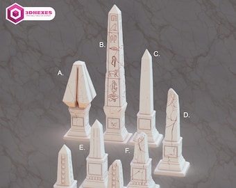 May include: Eight white, detailed, miniature stone obelisks with various carvings and designs. The obelisks are arranged in a semi-circle on a gray background. The text "3DHEXES" and "AMETHYST OASIS" are visible in the image.