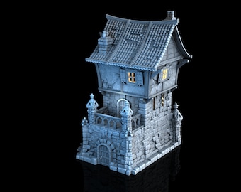 May include: A miniature stone building with a gabled roof, a balcony, and a small door. The building is painted in shades of gray and has a realistic texture.