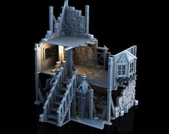 May include: A detailed model of a ruined building with exposed wooden beams and stone walls. The building has a second story with a small window and a wooden staircase leading up to it.