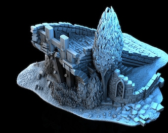 May include: A 3D printed miniature of a ruined stone building with a small tree growing out of the side. The building has a broken wooden door and a stone archway. The miniature is set on a base of textured sand.