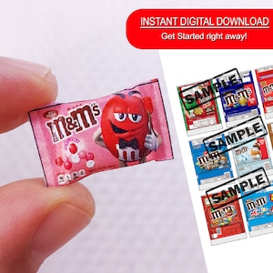 May include: Printable digital download of miniature M&M's candy packaging. The packaging is pink with a red M&M character wearing a bow tie. The packaging says "M&M's" in white letters.