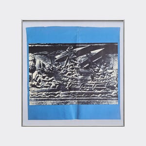May include: A square framed artwork featuring a high-contrast black and white print of a historical relief carving depicting a ship with multiple figures on a bright blue background. The print shows a central vessel with sails and numerous people.