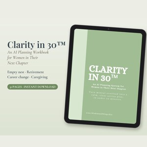 May include: A digital tablet displaying a green cover for the workbook Clarity in 30, an AI planning system for women in their next chapter. The text includes the title, subtitle, and the website address www.WisdomandWings.site on the screen.