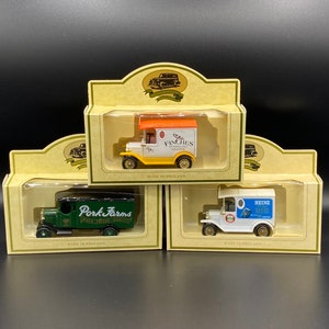 Trio of Vintage Lledo Promotional Diecast Models, Heinz Beans, Finches Orange, Pork Farms