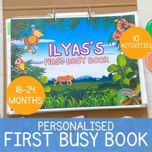 May include: A personalised jungle-themed busy book for children aged 18-24 months. The book has 10 activities and features a colourful illustration of a tiger, monkey, parrot, and chameleon. The cover reads "ILYAS'S FIRST BUSY BOOK".