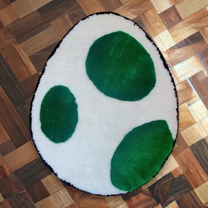 I made a tiny Yoshi egg rug to try burlap! : r/Tufting