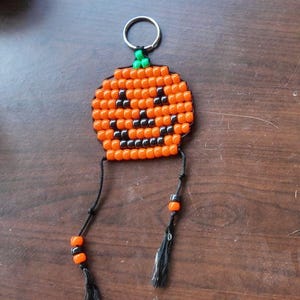 Pompoen Halloween-sleutelhanger en tasbedel met kralen