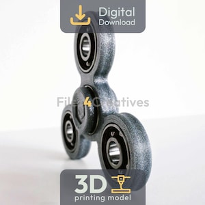 Puede incluir: Un spinner gris y negro con un diseño de tres lóbulos. La imagen incluye el texto "Digital Download" y "3D printing model". El spinner tiene un rodamiento central y tres rodamientos exteriores.