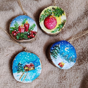 Hand painted wooden slices made from recycled material, to hang on the Christmas tree or as a winter decoration for the home. Pack of 4