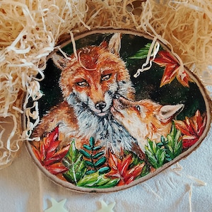 Foxes painted on wood slice, decorative acrylic painting. Portrait of cubs, wild animals, natural art, handmade gift idea