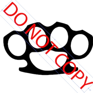 May include: Black metal knuckle duster with four holes.
