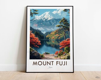 May include: A vintage travel poster featuring a scenic view of Mount Fuji in Japan. The mountain is snow-capped and surrounded by lush green trees and a calm lake reflecting the mountain. The poster has a black frame and the text "MOUNT FUJI Japan" at the bottom.