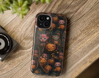 May include: A black phone case with a Halloween-themed design featuring a dark background with orange pumpkins and cute pink and gray kittens.