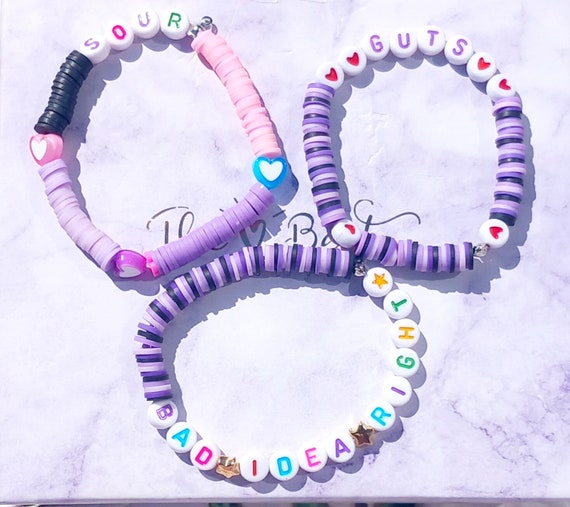 Three adorable Olivia Rodrigo Themed Bracelets.