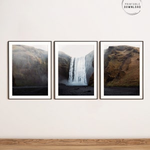 May include: Three framed prints of a waterfall in Iceland. The left print shows a misty green hillside, the middle print shows the waterfall cascading down a rocky cliff, and the right print shows a brown hillside.