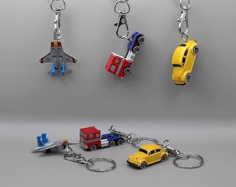 Transformatoren Schlüsselanhänger in Geschenkbox, Autobots & Decycle