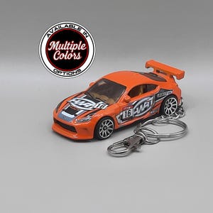 Porte-clés Toyota GR86 en coffret cadeau, miniature en métal moulé sous pression, modifié à la main, cadeau idéal pour les passionnés de voitures.