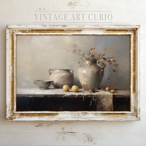 May include: A still life painting in a white frame with gold accents. The painting depicts a gray ceramic vase with a bouquet of dried branches and yellow fruit. Two additional gray ceramic pots are on a table with more yellow fruit.