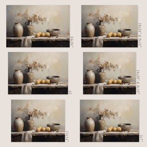 May include: A still life painting featuring two ceramic jugs, a bowl, and lemons on a table with a white cloth. The background is a light gray wall with a branch of leaves.