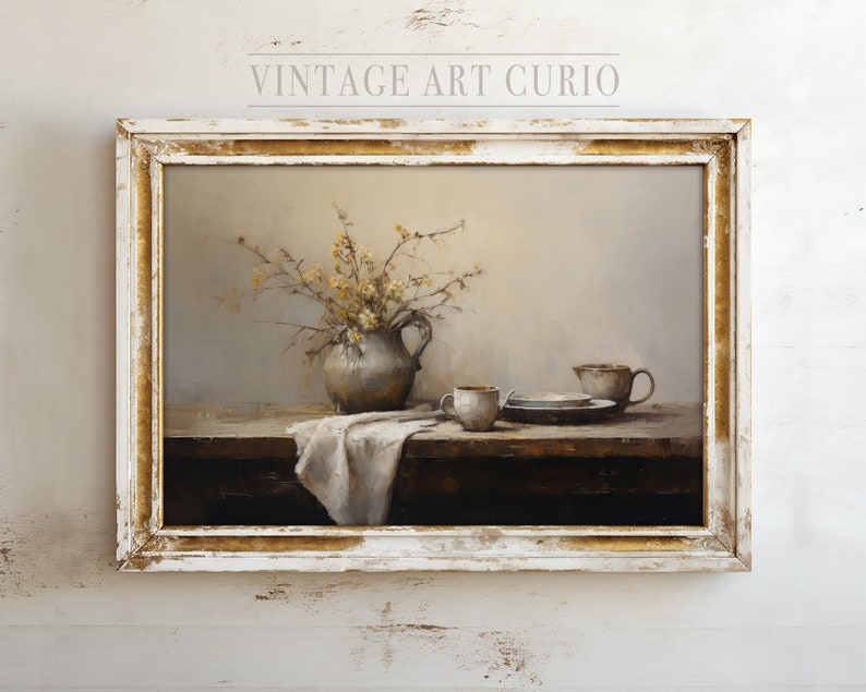 May include: A framed painting of a still life with a vase of yellow flowers, a pitcher, and three cups on a wooden table. The painting is in a white frame with gold accents.