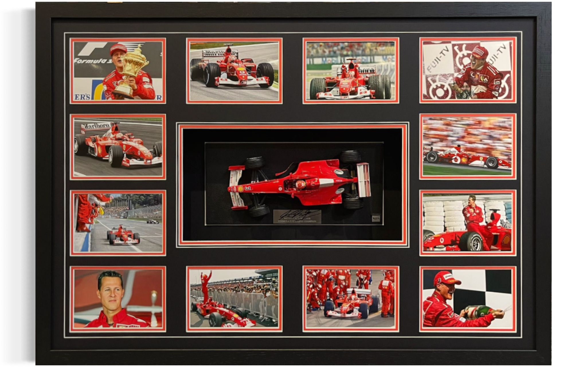 Michael Schumacher F1 Memorailia는 눈 경매의 합을 가져옵니다.