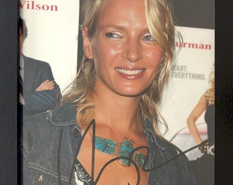 Uma Thurman, 100% Guaranteed Hand Signed Original Photo - With UACC COA - Certificate Of Authenticity. Black Framed (10' inch X 8' inch).