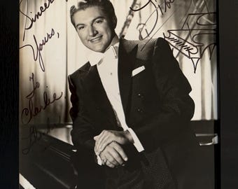 Liberace, Entertainer, Pianist, 100% Guaranteed Hand Signed Photo Presentation, Framed 25cm x 20cm - With COA - Certificate Of Authenticity.