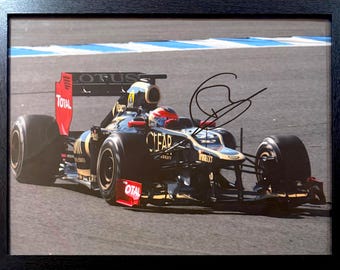 Romain Grosjean Hand Signed Formula 1 Framed (40cm x 30cm) Team Lotus Photograph Complete With AFTAL COA Certificate Of Authenticity