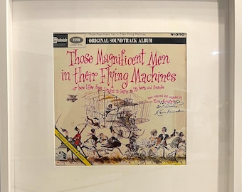 Ken Annakin 'Those Magnificent Men In Their Flying Machines' Director - Guaranteed Hand Signed Album - Quality Framed 50cm x 50cm with COA
