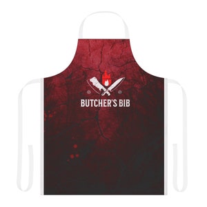 May include: Red butcher's bib apron with a distressed, cracked background. The apron has a white logo with crossed butcher knives, a flame, and the text "BUTCHER'S BIB".