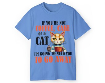 May include: A light blue t-shirt with the text "If you're not coffee, cake or a cat, I'm going to need you to go away." The text is in black and orange. A cartoon cat is holding a cup of coffee and a cupcake.