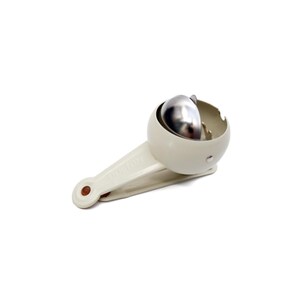 May include: A white plastic cigarette holder with a silver metal ball on the end. The holder has a red dot on the side.