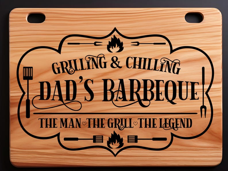 May include: A wooden cutting board with an engraved design that says "Grilling & Chilling Dad's Barbeque The Man The Grill The Legend".