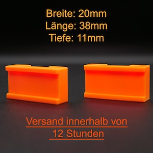 Könnte beinhalten: Zwei leuchtend orangefarbene Plastikblöcke, jeder 20 mm breit, 38 mm lang und 11 mm tief. Der Text "Breite: 20mm, Länge: 38mm, Tiefe: 11mm" ist über den Blöcken gedruckt. Der Text "Versand innerhalb von 12 Stunden" ist unter den Blöcken gedruckt.
