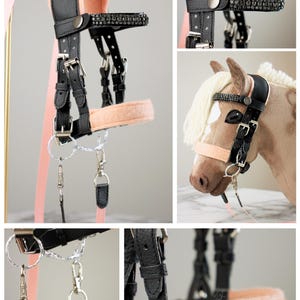 May include: A black leather horse bridle with peach-colored felt padding, featuring a browband adorned with small black crystals, silver-toned metal buckles, and a matching peach-colored lead rope. The set includes a plush horse head model.