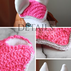 May include: A bright pink crocheted horse ear bonnet featuring white fabric ear covers. The edges are trimmed with a white braided cord and a row of sparkling clear rhinestones. The design includes a textured crochet pattern and a white border.