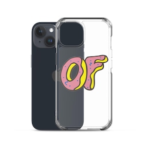 May include: A clear phone case with a pink and yellow donut-shaped "OF" graphic. The case is on a black smartphone. The graphic has a pink frosted donut with blue sprinkles and yellow filling. The phone case is transparent.