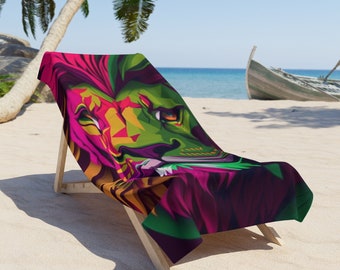 May include: A beach chair with a colorful beach towel featuring a graphic design of a lion's face. The towel is green, pink, yellow, and orange.