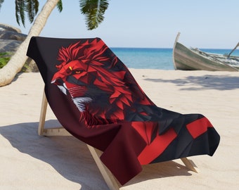 May include: A red and black beach towel with a geometric lion design. The towel is folded and placed on a wooden beach chair.