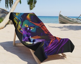 May include: A beach chair with a colorful lion design on the fabric. The lion's mane is a mix of purple, orange, and green. The chair is on a sandy beach with a wooden boat in the background.