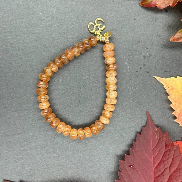 Bracelet en pierres naturelles en citrine et pendentif ohm