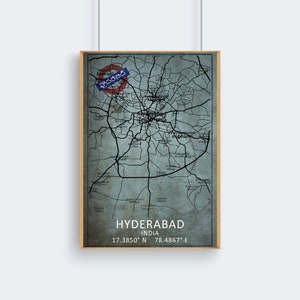 May include: A vintage-style map of Hyderabad, India, with a blue and grey colour scheme. The map shows the city's streets and landmarks, with the text "HYDERABAD INDIA 17.3850° N 78.4867° E" at the bottom.