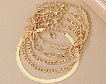 Ensemble de bracelets en plaqué or 18 carats : chaînes cubaines, trombone et chevrons