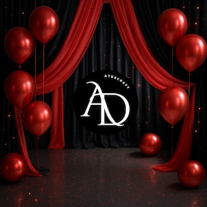 May include: A black backdrop with red curtains and a circle with the letters "AD" in white. There are red balloons hanging from the top of the backdrop.