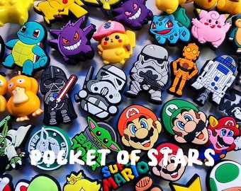 2024 Croc charm / jibbitz - 915 Choices (516-553 Pikachu, Pokemon, Star Wars, Mario, Peach)