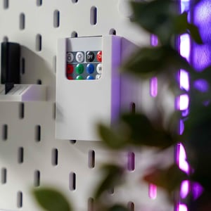 Supporto per telecomando a LED compatibile con Ikea Skadis, pannello forato