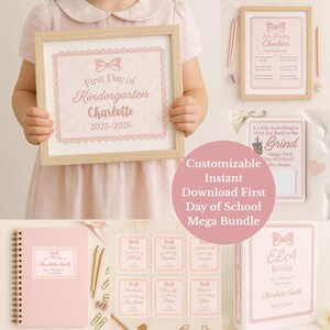 May include: A collection of pink school-themed stationery items, including a framed sign that reads "First Day of Kindergarten Charlotte 2025-2026", a notebook, and various cards. The items have a bow and polka dot design.